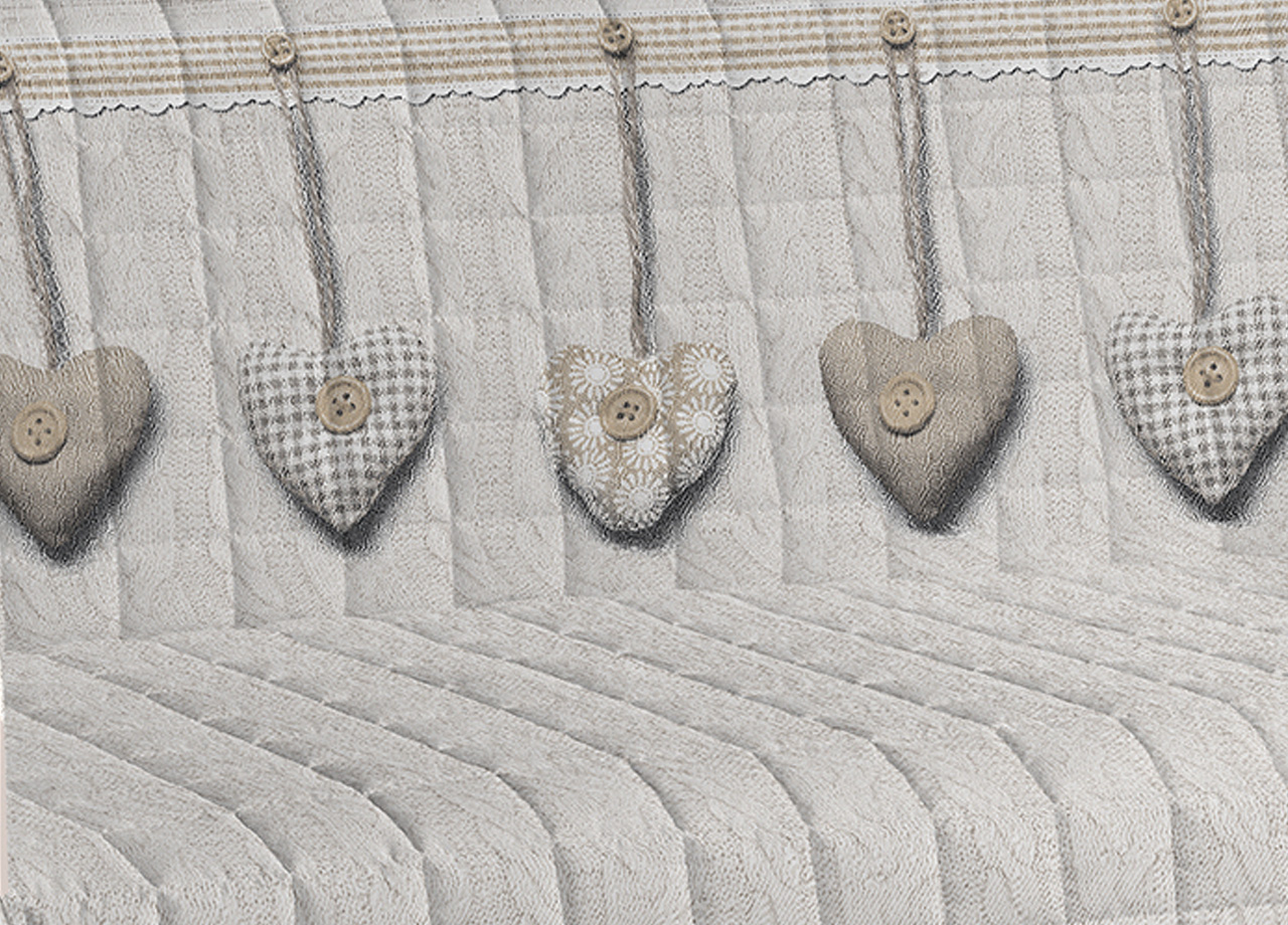 DETTAGLIO COPRIDIVANO CUORE BEIGE