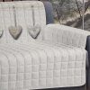 DETTAGLIO COPRIDIVANO CUORE BEIGE 2