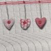 DETTAGLIO COPRIDIVANO CUORE ROSSO