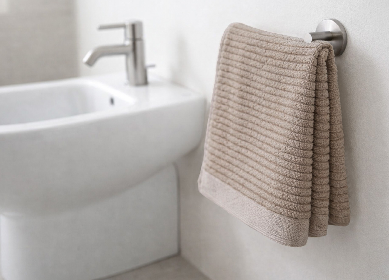 Asciugamani Salvietta Bagno In Morbida Spugna Modello Boutique Colore Tortora - immagine 2